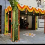 Orange and yellow marigold house entrance decoration