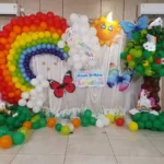 Rainbow balloon arch birthday decoration with butterfly and unicorn theme